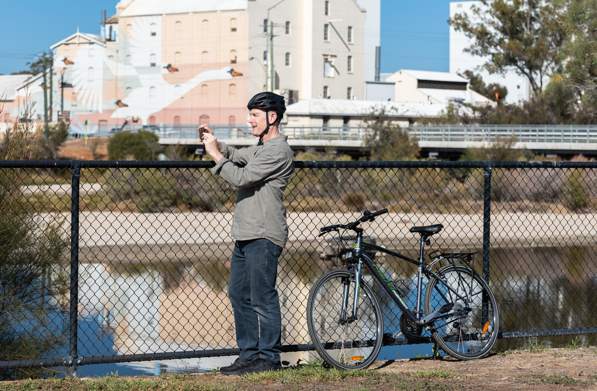 Bike rider stopping to take photo